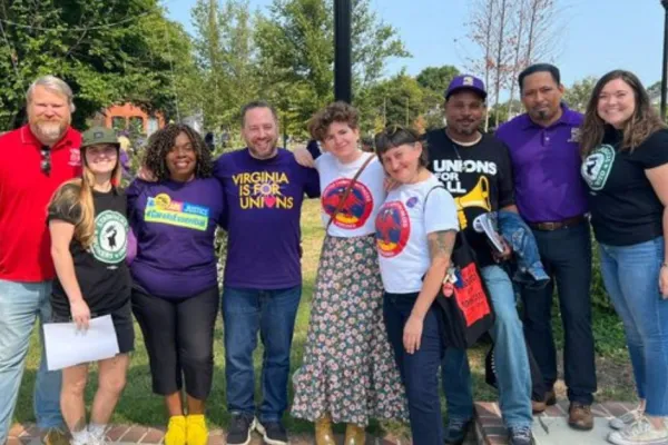 Union members stand together