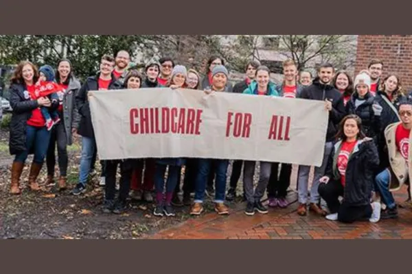 UCWVA members with Childcare for All banner