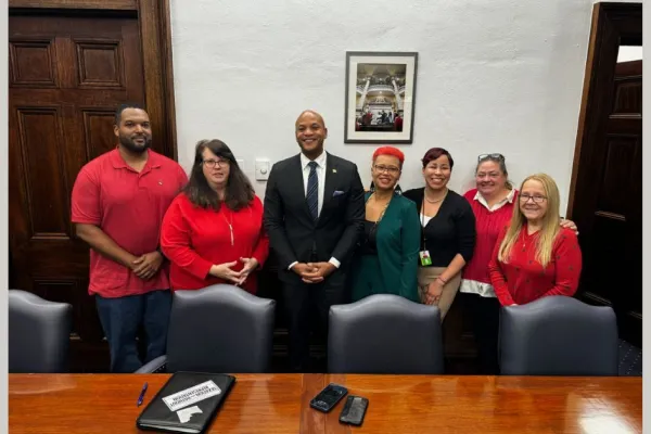 CWA members in red with Maryland Governor Moore
