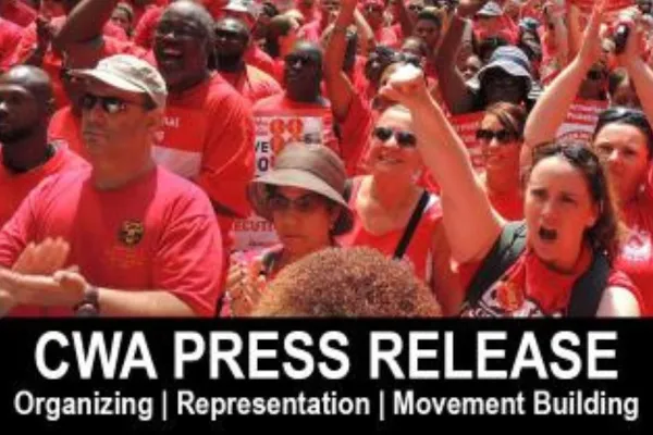 CWA press release members in red at rally