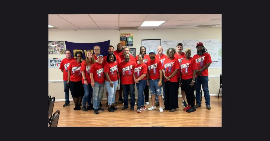 Virginia members in red in classroom