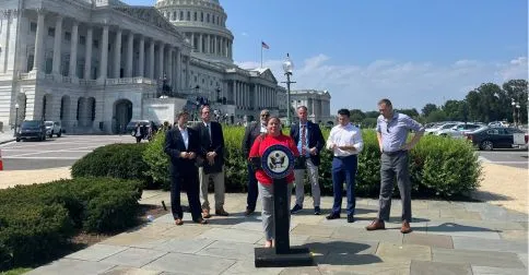Local 2107 President Shannon Opfer speaks in front of Capitol