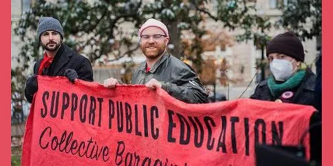 three people holding red "support public eduction" banner