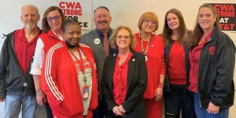 eight CWA members of AT&T Legacy T bargaining team in red