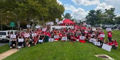 Maryland ZeniMax members in red with signs